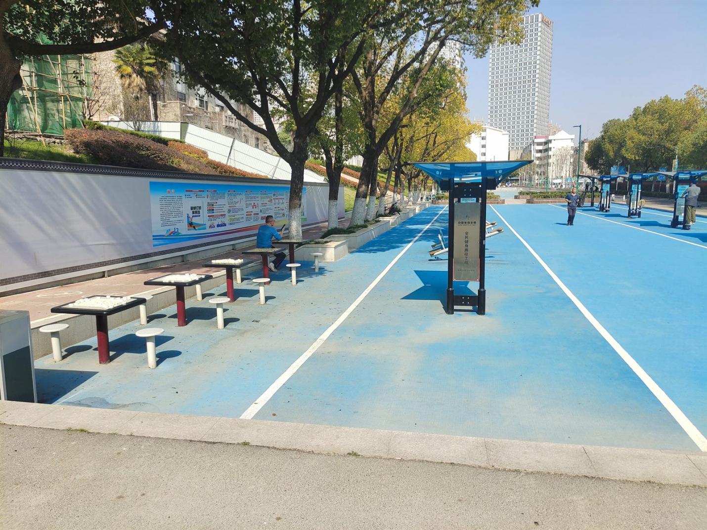 finished surface around outdoor fitness equipment.