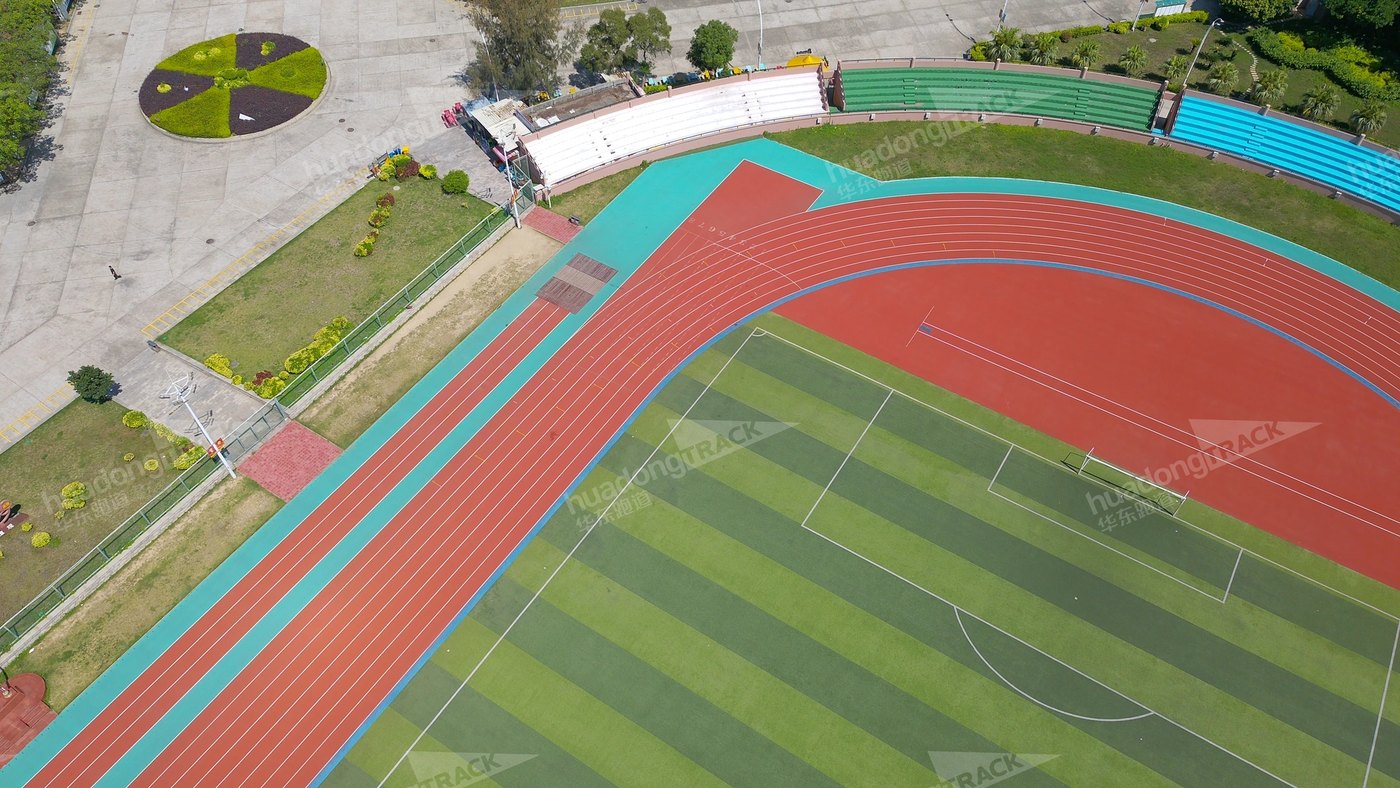 Track curve, straight lanes and infield at Huian County Sports Center