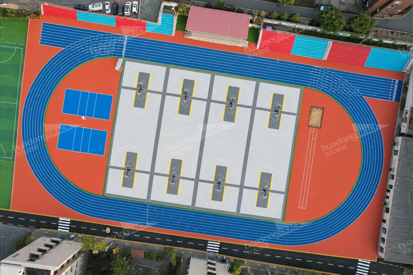 Overhead view of the blue oval running track at Changchun Hope High School