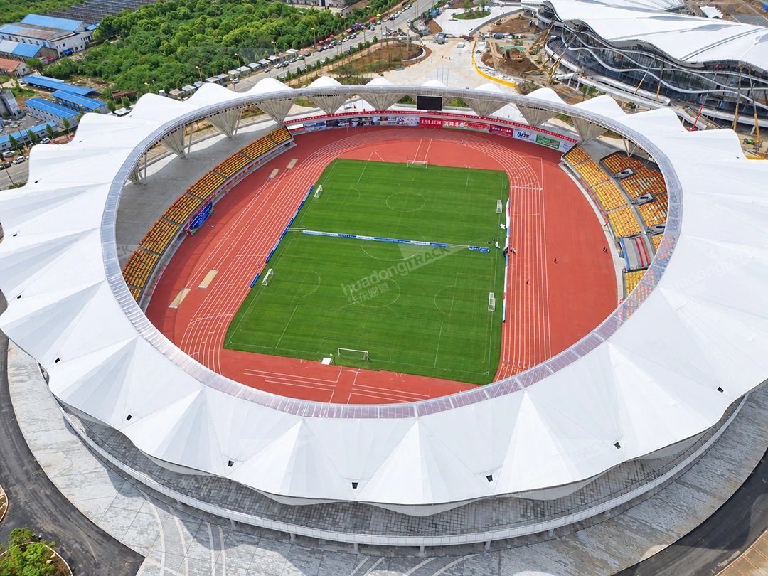 Aerial view of the red oval running track at Anlu Sports Center